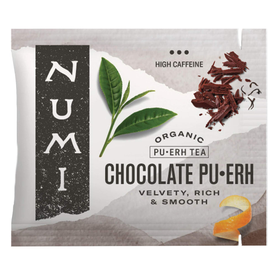 Numi Chocolate Pu-erh Tea bag reveals cacao notes for a comforting energizing brew.