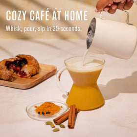 Numi Organic Turmeric Latte Powder measuring scoop for easy portioning.