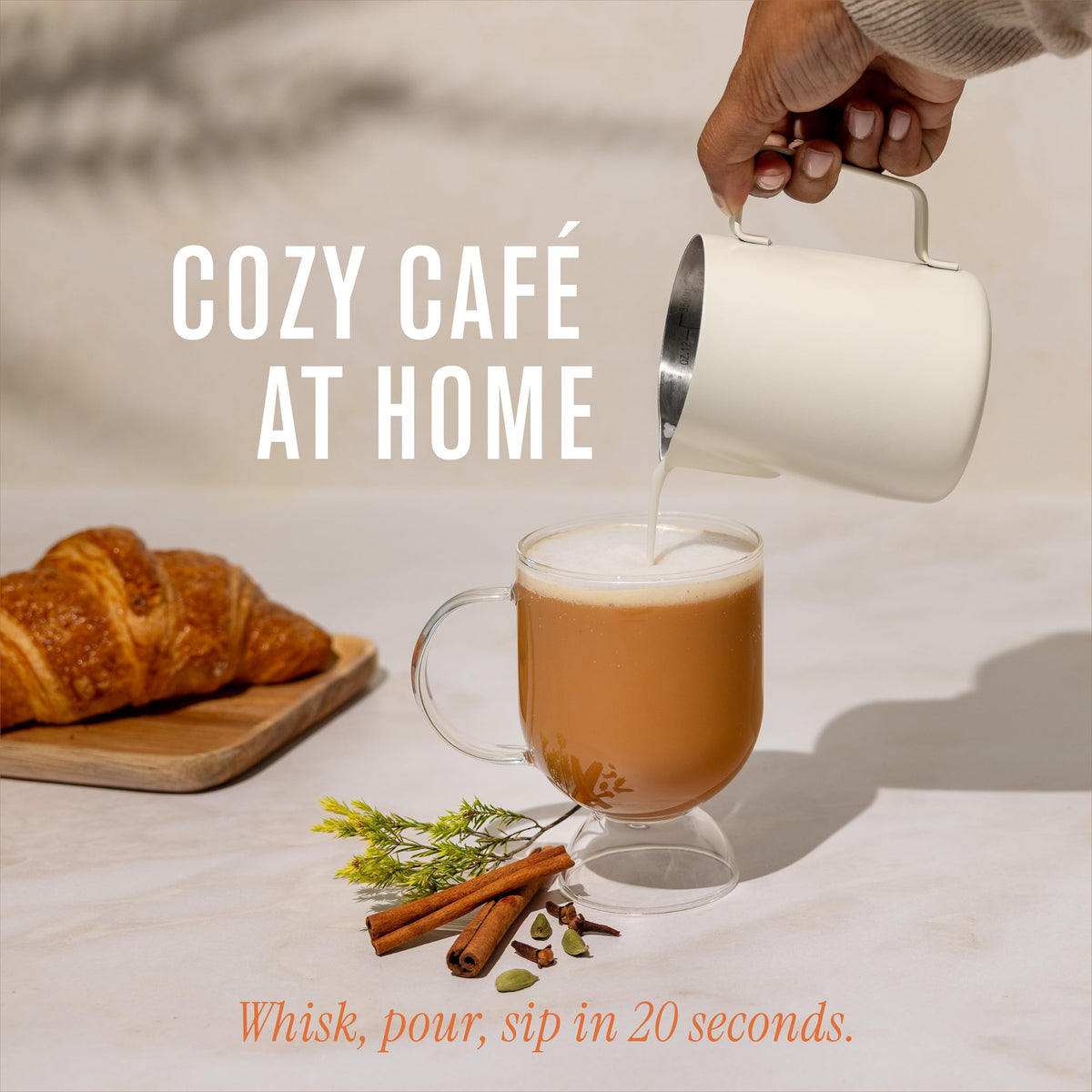 Numi Rooibos Chai Latte Cup with steam shows caffeine-free, comforting latte option