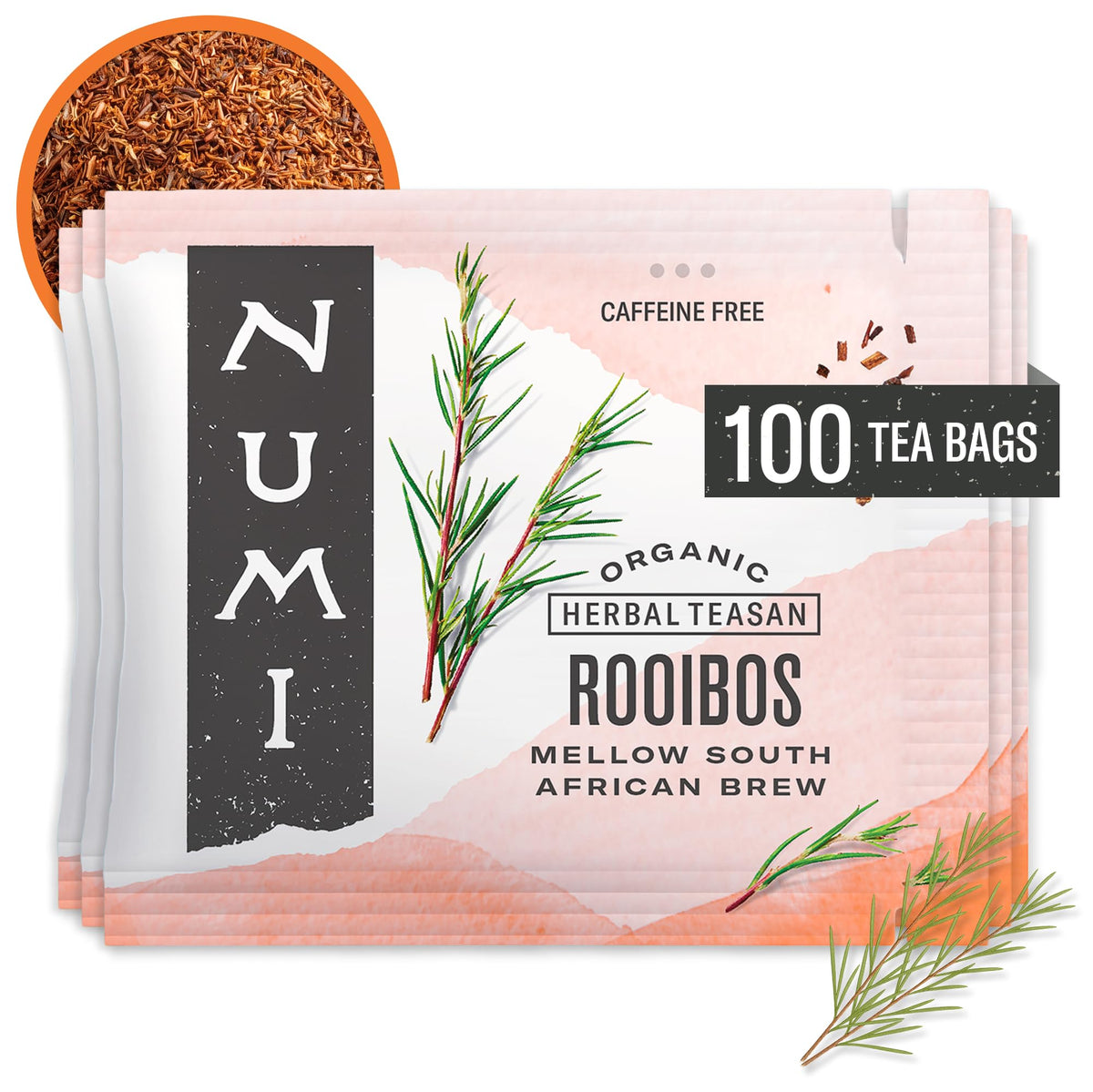 Numi Rooibos tea bags beside a warm amber cup for a caffeine-free sip