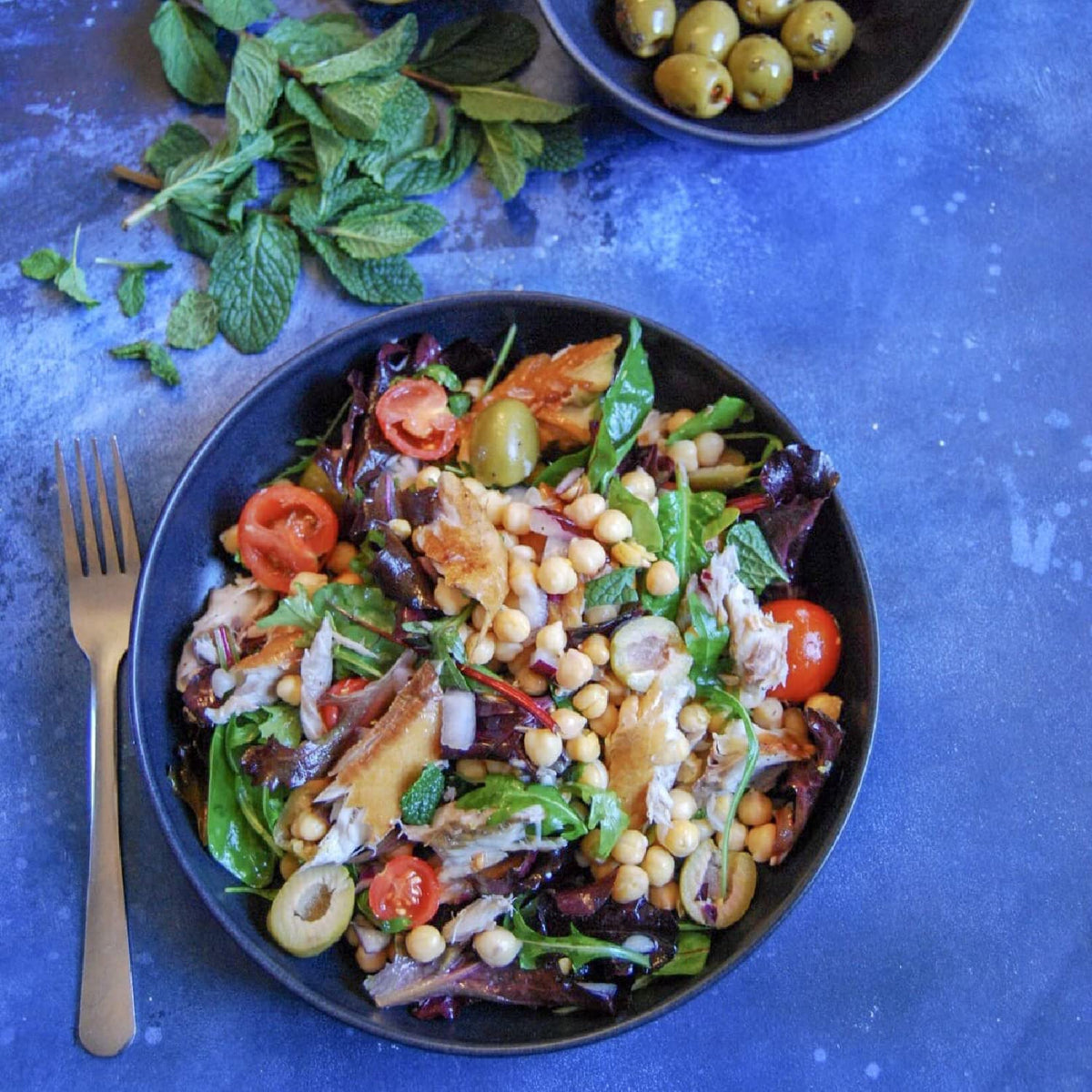 Nuri handcrafted can and vintage design elevate pantry or chef's repertoire.