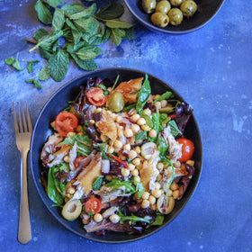 Nuri handcrafted can and vintage design elevate pantry or chef's repertoire.