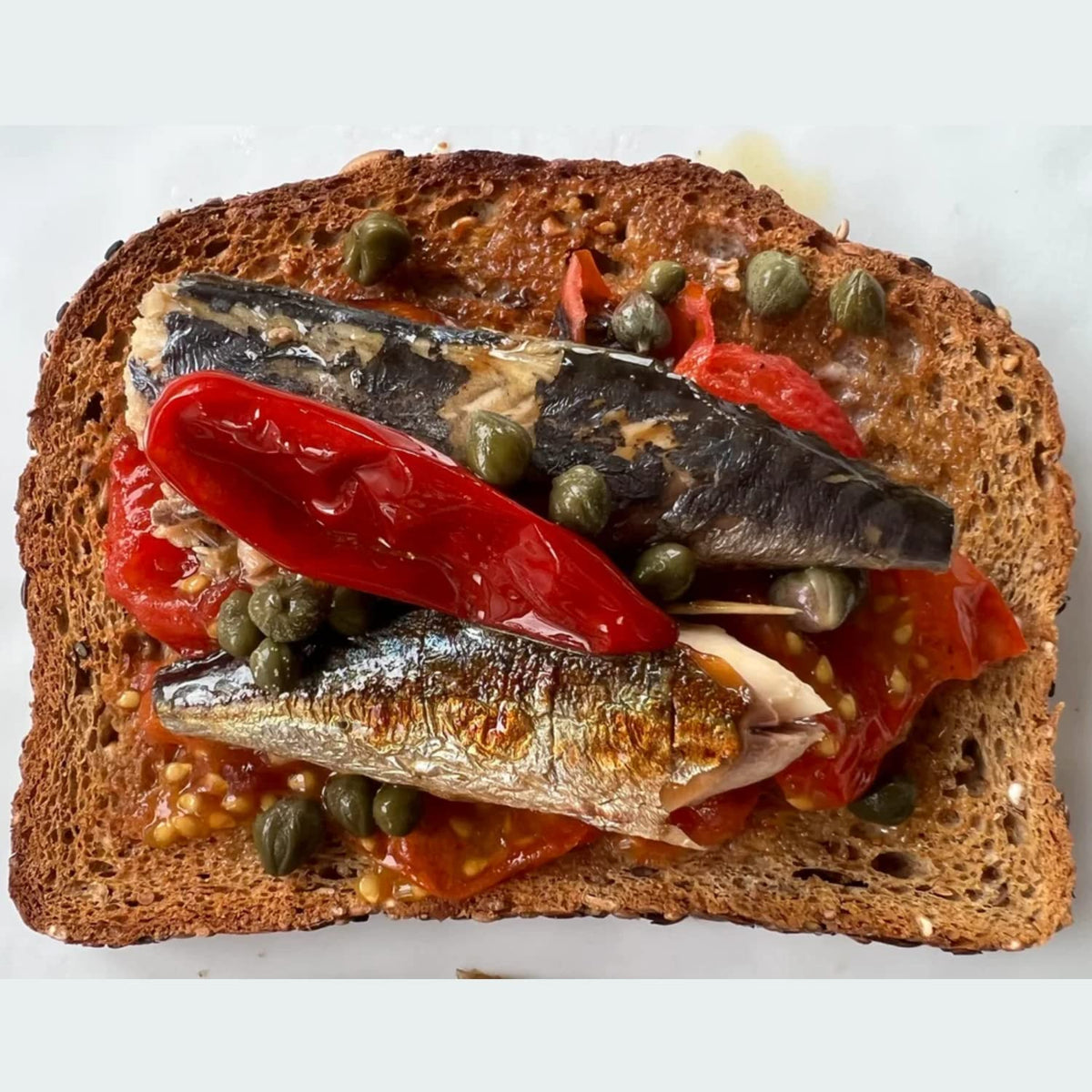 Nuri mackerel spiced with chili and cucumber, perfect for quick salads.
