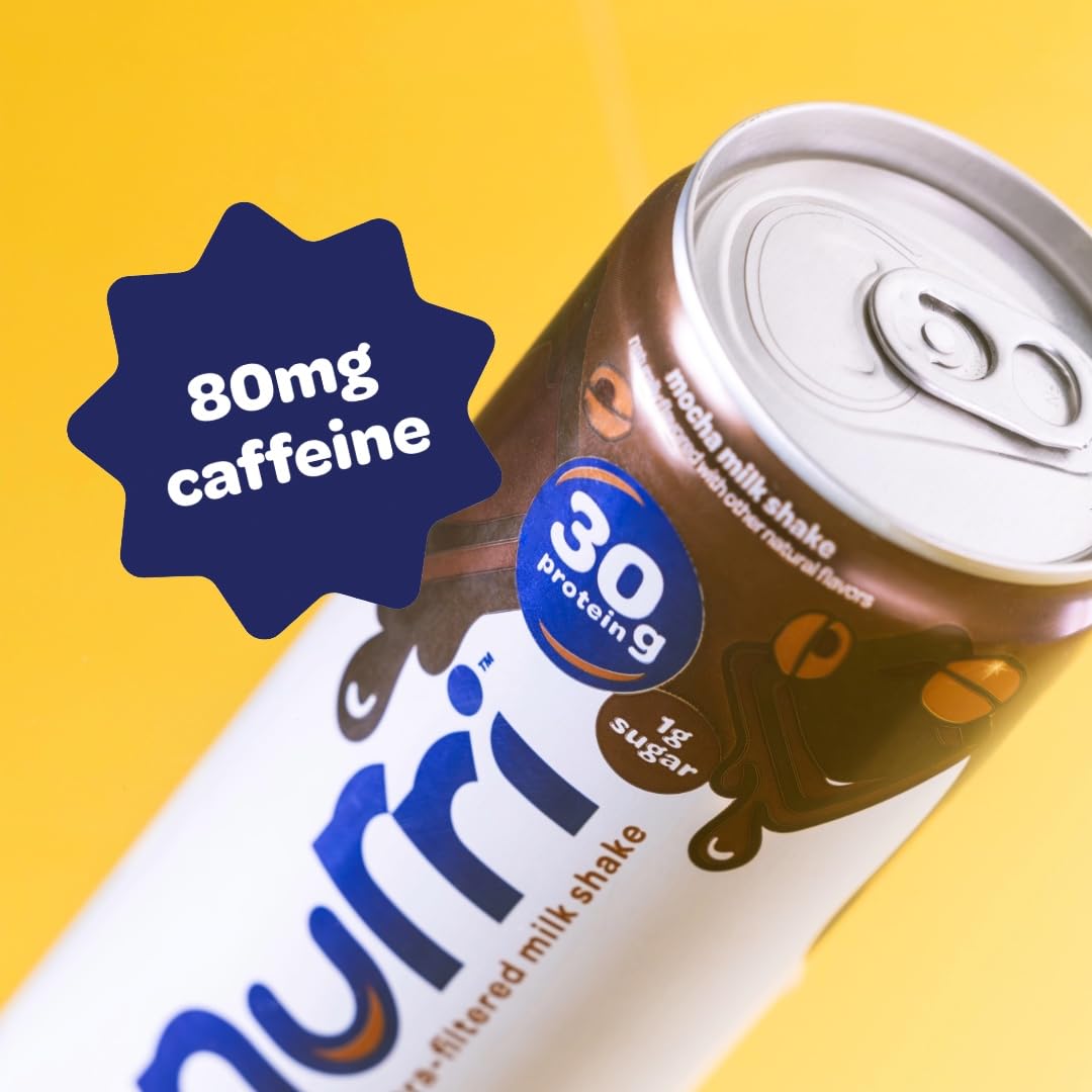 Nurri glass with can setup suggests convenient post-workout refreshment.