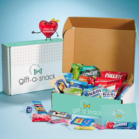Nut Cravings Gift A Snack box open, showcasing a diverse snack lineup.