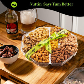 Nut Cravings green hexagon tray showcases snacks inside.