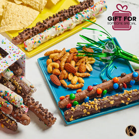 Nut Cravings KREMERY milk chocolate dip on pretzels for a creamy bite