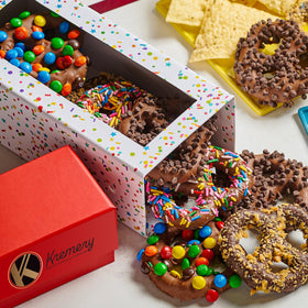 Nut Cravings KREMERY white chocolate pretzels with candy toppings, great for gifting.
