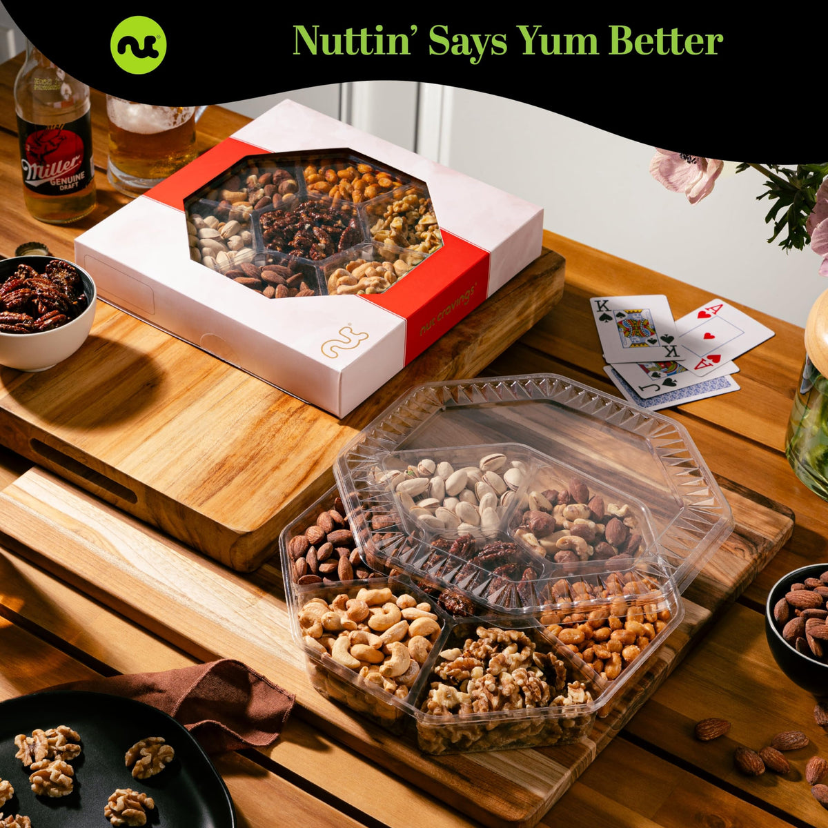 Nut Cravings red gold box packaging highlights elegant design for gifting.