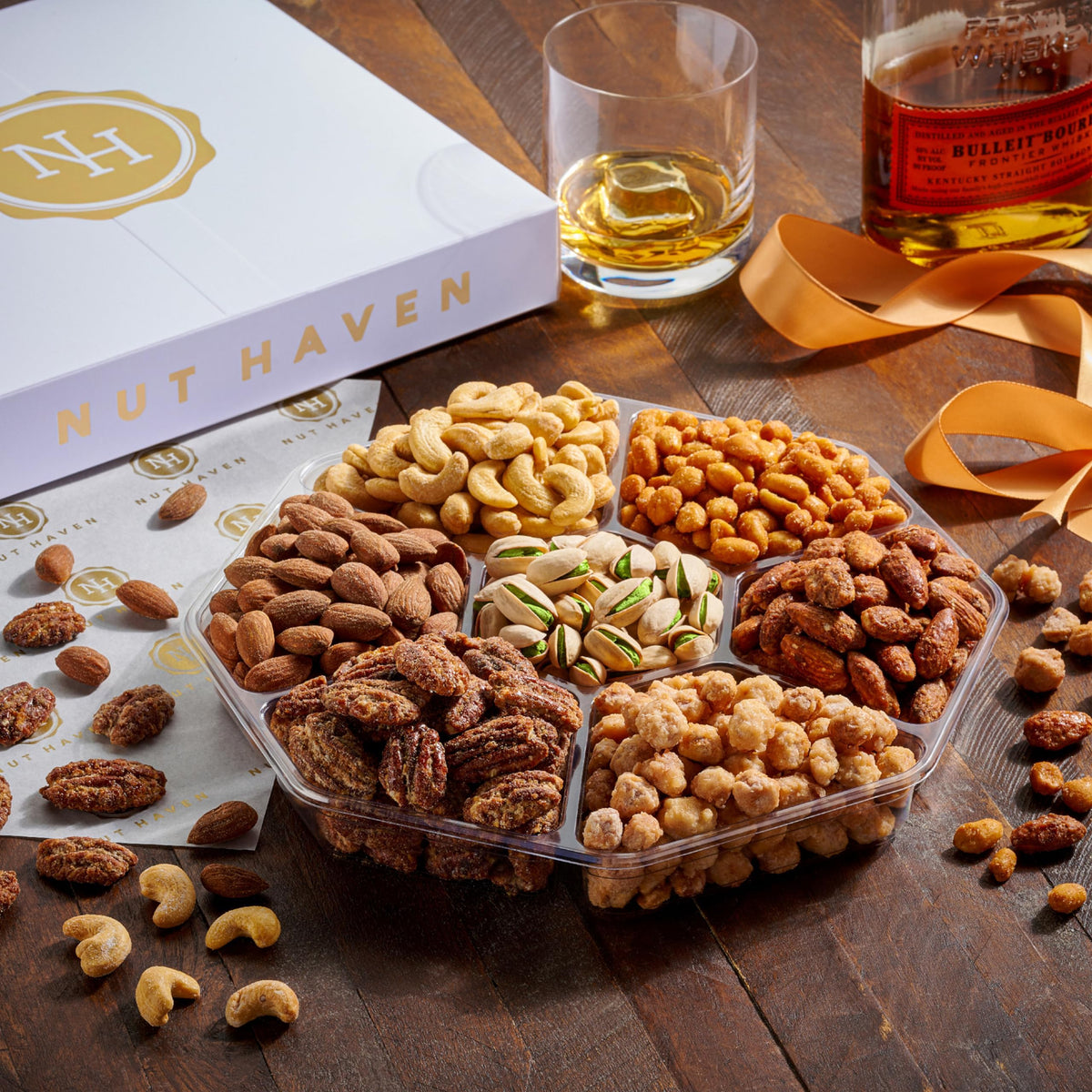 Nut Haven deluxe mixed nuts: Toffee peanuts and glazed almonds, ideal for snacking.