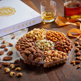 Nut Haven deluxe mixed nuts: Toffee peanuts and glazed almonds, ideal for snacking.