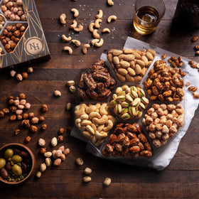 Nut Haven deluxe nut variety featuring toffee peanuts and glazed almonds for crowd-pleasing snacking.