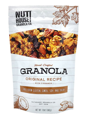 NutHouse! Granola bowl featuring organic oats and nuts, ideal as yogurt topping.