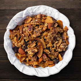 NutHouse! Granola ingredients close-up showing balanced crunch for snacking.