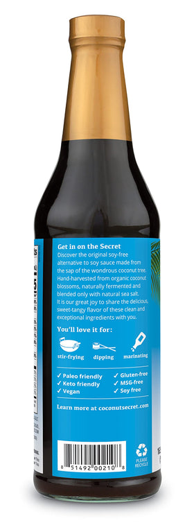 Nutiva Coconut Aminos bottle beside organic certification and eco-friendly branding.