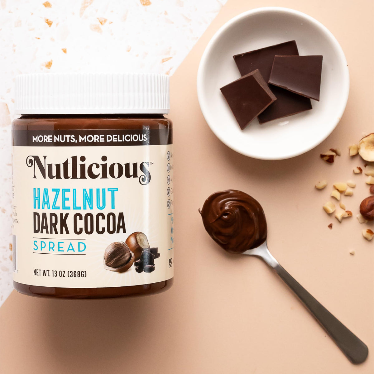 Nutlicious Hazelnut Dark Cocoa Spread dessert topping for decadent treats.
