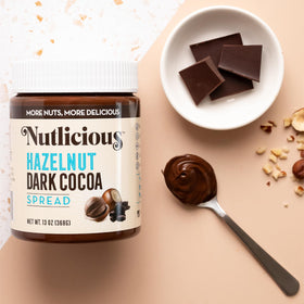 Nutlicious Hazelnut Dark Cocoa Spread dessert topping for decadent treats.