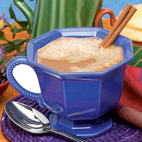 Nutmeg State Nutrition high protein cappuccino cup on a kitchen counter.