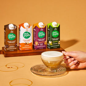 Nutpods creamer poured into coffee showing smooth dairy-free texture