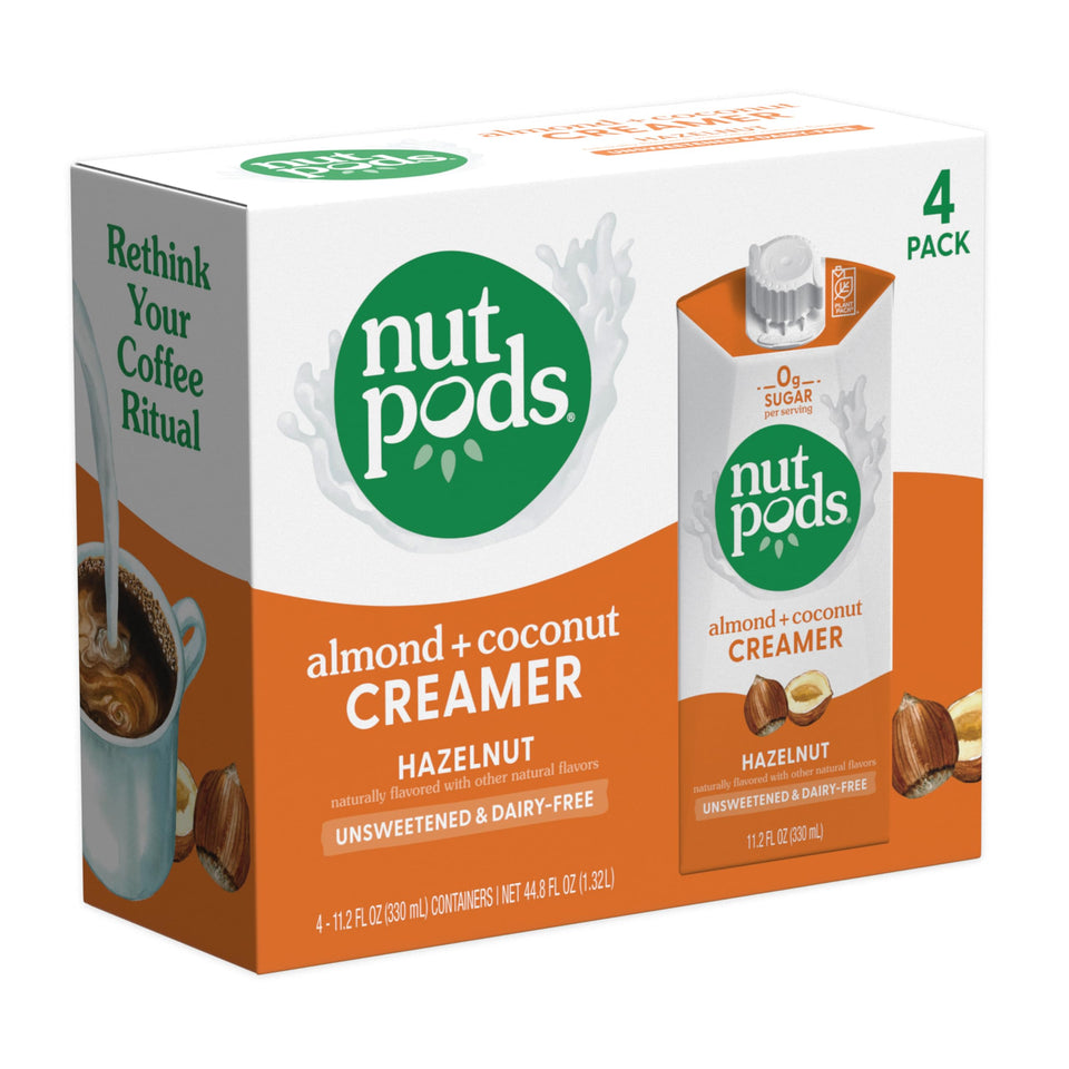 nutpods Hazelnut Creamer bottle pour—zero sugar, dairy-free coffee option.
