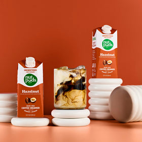 Box of four nutpods Hazelnut Creamer cartons, gluten-free and non-GMO.