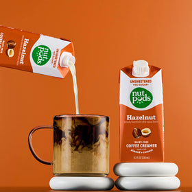 Shelf-stable 11.2 oz cartons of nutpods Hazelnut Creamer ready to store.