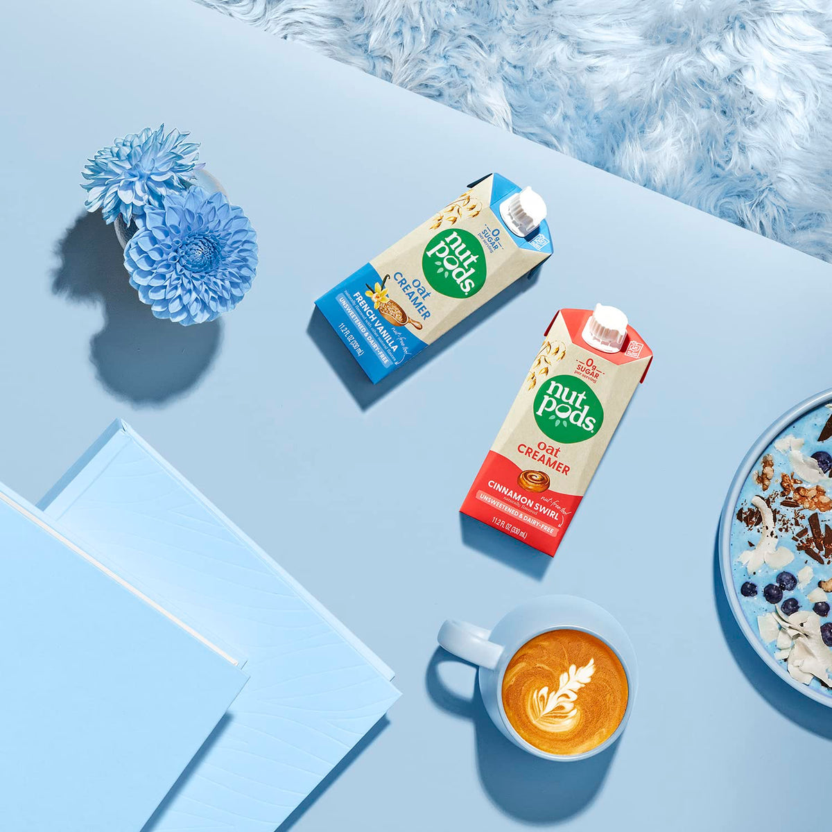 nutpods Oat vegan-certified bottle highlights plant-based, kosher, non-GMO credentials.