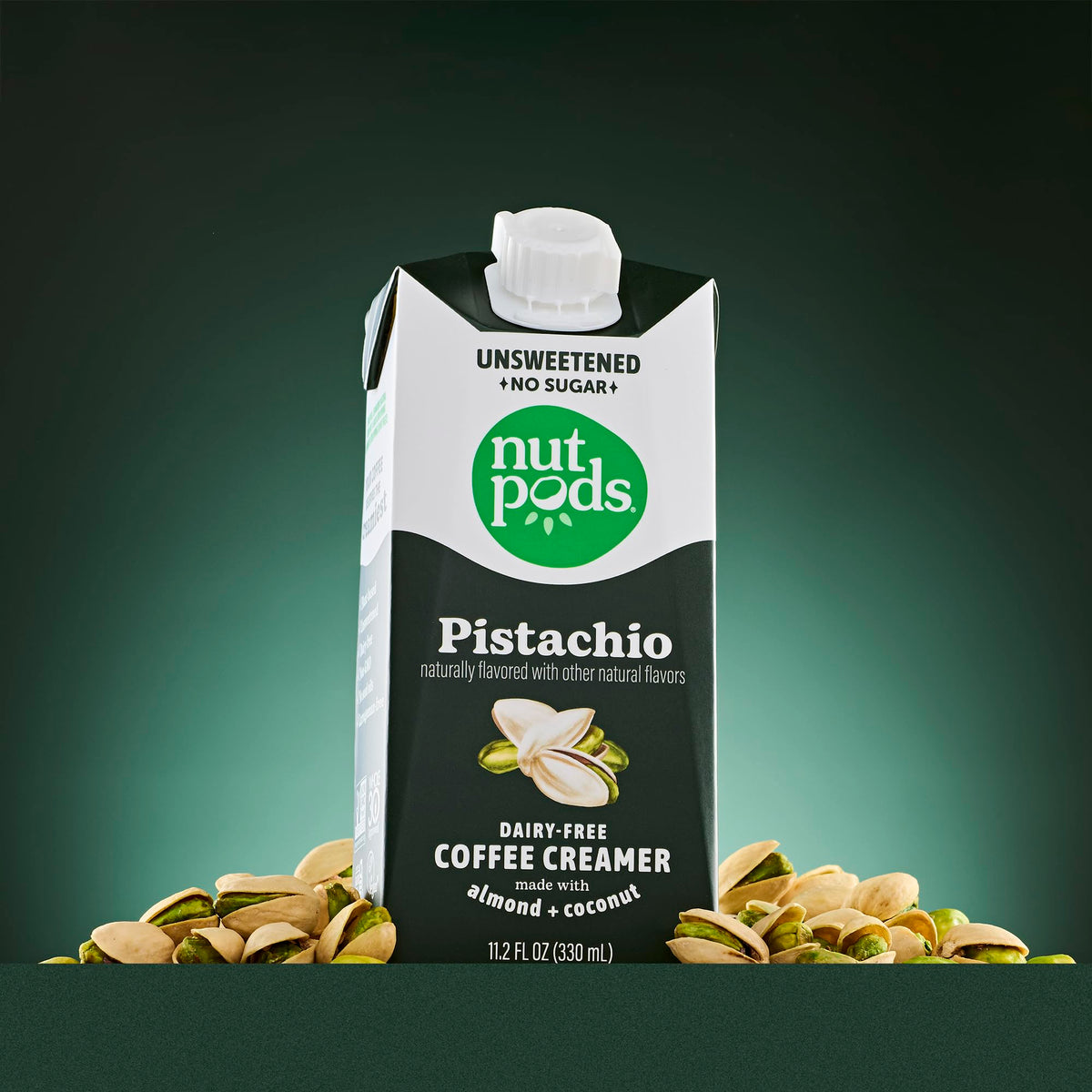 Close-up of the nutpods Pistachio Unsweetened Creamer label showing dairy-free and keto-friendly claims.
