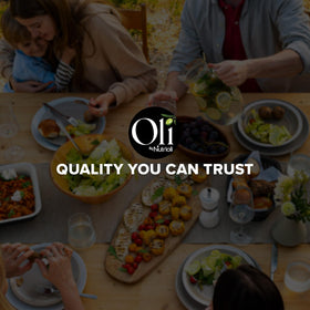 Nutrioli Oli packaging on kitchen counter with fresh produce.
