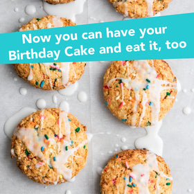 Nuts 'N More Birthday Cake Peanut Butter Spread on spoon with sprinkles, tasty