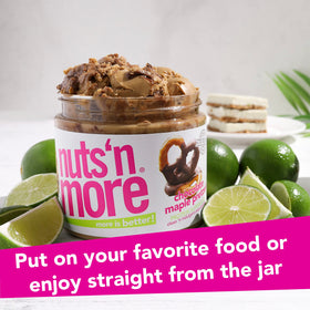 Nuts N More spread on sliced apple for a quick healthy fruit snack