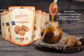 Dry roasted pecans closeup reveals crunchy praline texture and golden caramel.