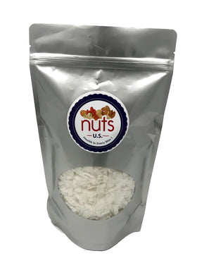 NUTS U.S. unsweetened coconut chips close up showing crisp texture.