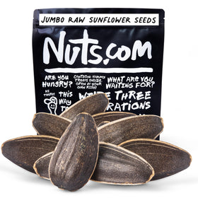 Nuts.com jumbo raw sunflower seeds in shell on shelf for healthy snacking.