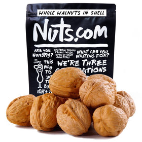 Nuts.com whole walnuts in shell in resealable bag preserving freshness.