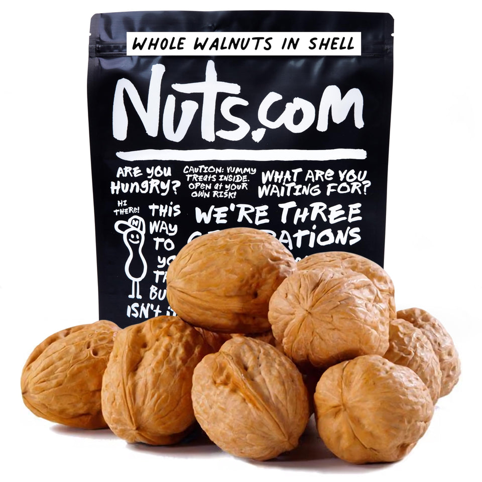 Nuts.com whole walnuts in shell in resealable bag preserving freshness.