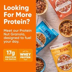NuTrail granola with milk being poured into a bowl.