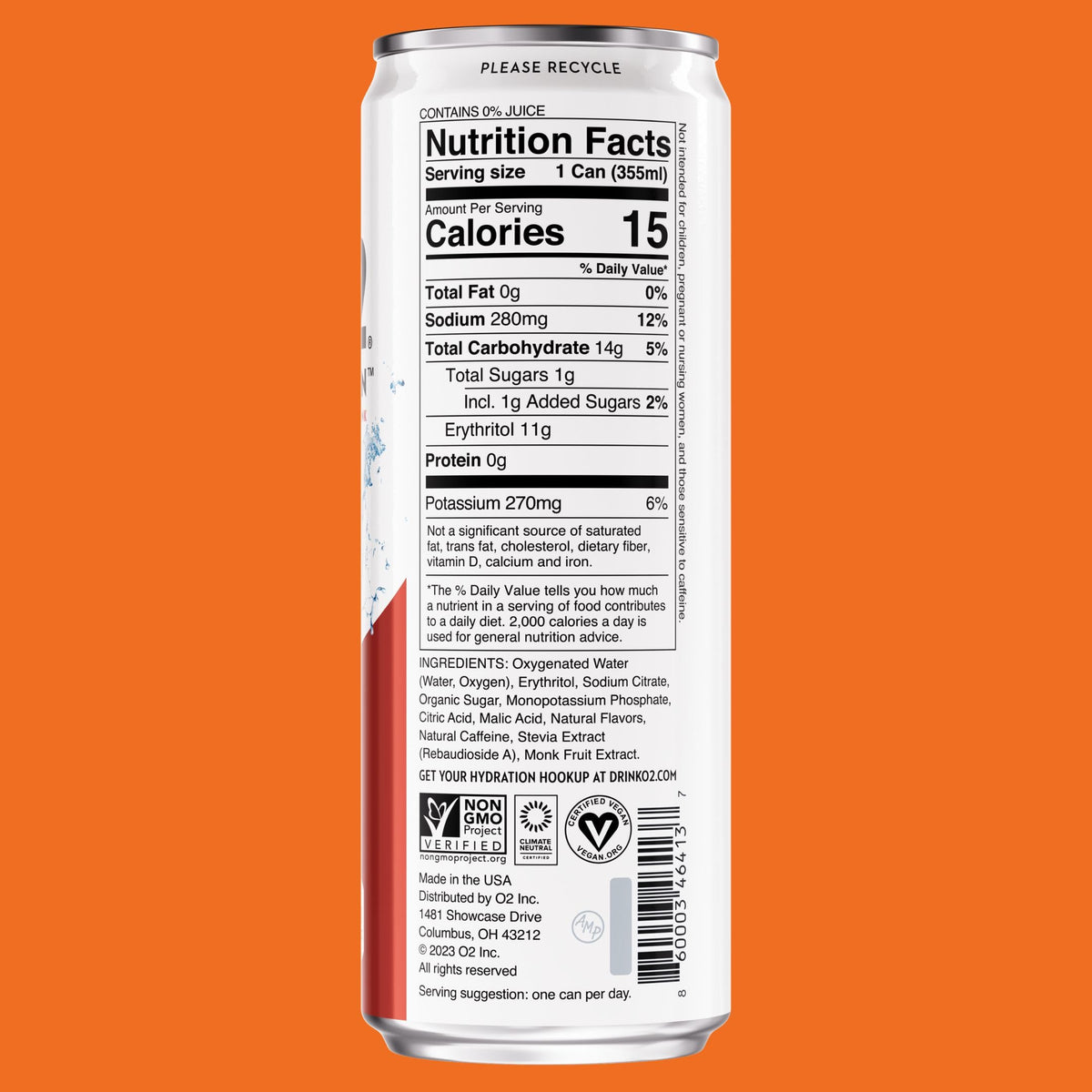 Glass filled with O2 drink, vibrant orange mango flavor.