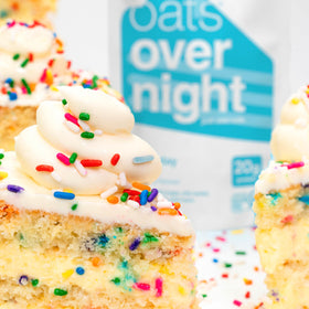 Oats Overnight Birthday Cake 8-pack box on shelf suggests bulk value.