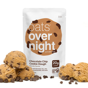 Oats Overnight Chocolate Chip Cookie Dough bowl serving next to coffee.
