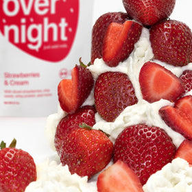 Oats Overnight Strawberries & Cream glass pour image suggests grab-and-go convenience.