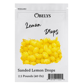 Close-up of OBELYS Lemon Drops showing the sandy sugar texture.