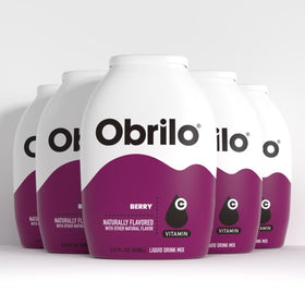 Obrilo Berry water enhancer bottle close-up, sugar-free flavor for everyday hydration.