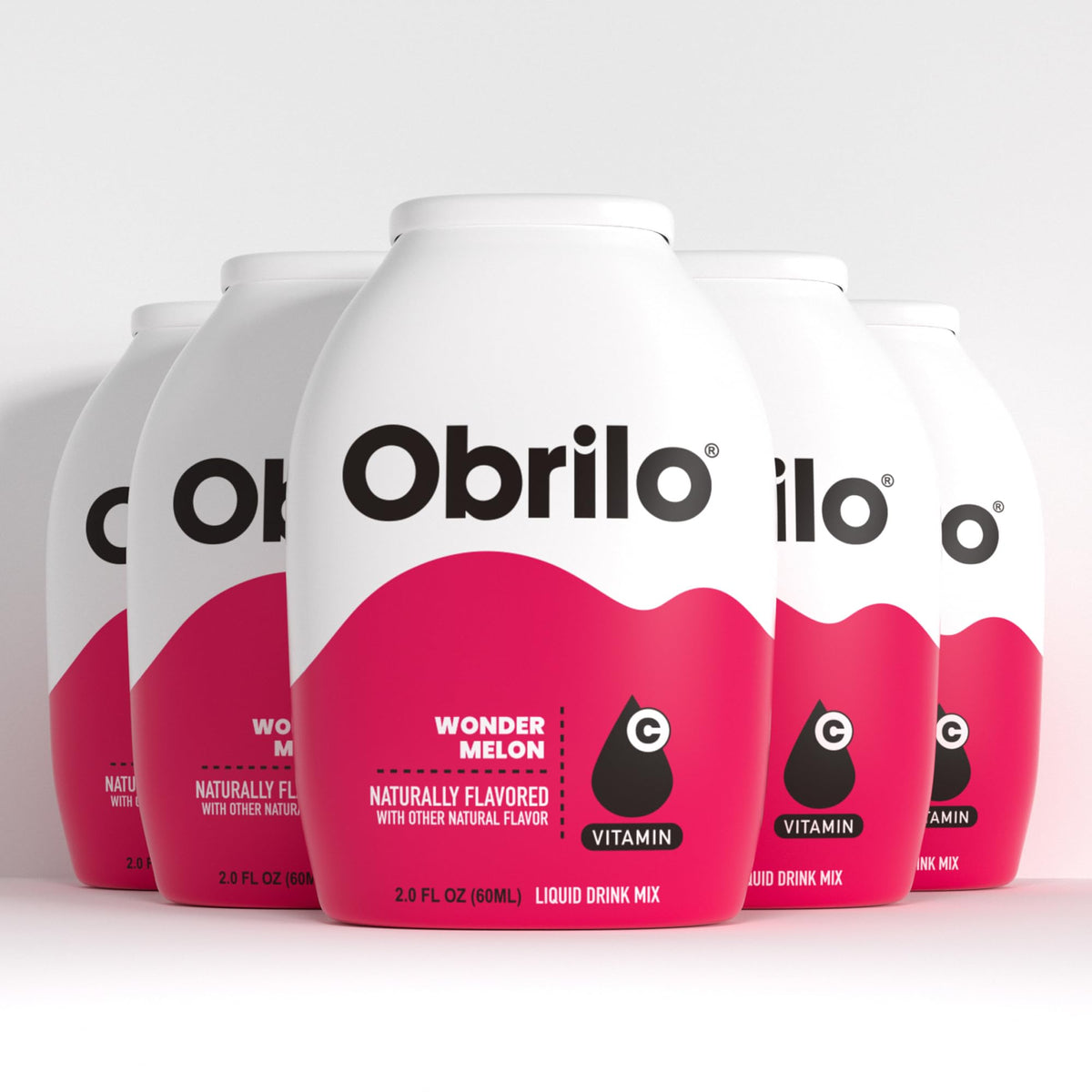 Obrilo water enhancer bottle pour demonstrates customizable hydration for everyday use.
