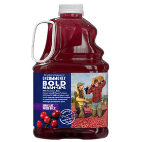 Pouring Ocean Spray Cran-Grape into a glass for bold, fruity flavor.