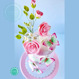 O'Creme Peony gumpaste flower in white adds sophisticated wedding cake flair.
