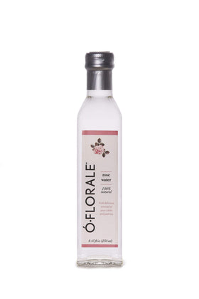 OFLORALE rose water close-up on petals, showcasing purity and aroma