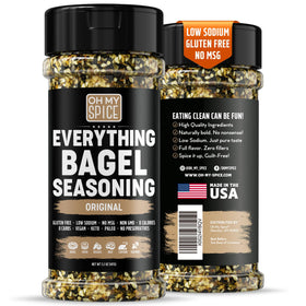 Oh My Spice Everything Bagel Seasoning Blend on a spoon with sesame seeds for savory crunch.