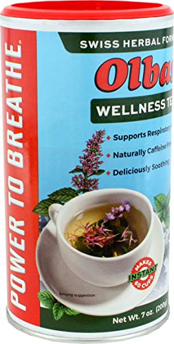 Cup with Olbas Herbal Tea steam invites a soothing daily ritual.