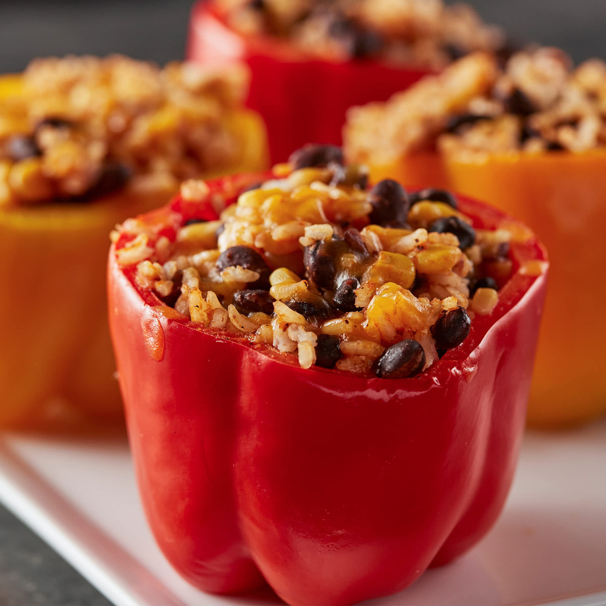 Old El Paso Cheesy Mexican Rice Mix steaming, fluffy grains ready in minutes.